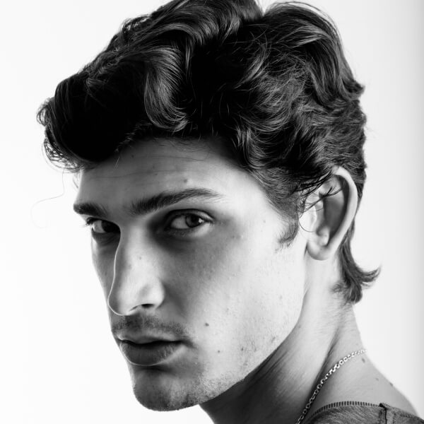 face-of-young-handsome-man-looking-back-VQ5CDCZ-1